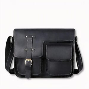 cartable vintage en cuir noir pour homme, sur fond gris clair