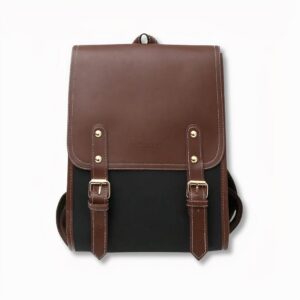 Sac à dos cartable style retro pour femme noir et marron en simili cuir, sur fond gris clair